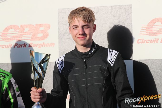 Bruce Knook op podium